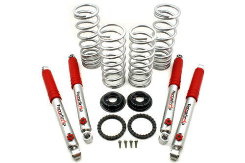Kit de Conversión de Muelles +2" para Discovery 2 - Carga Media - Incluye Amortiguadores 4 STAGE ADJUSTABLE +3" (7,62cm.) - TERRAFIRMA